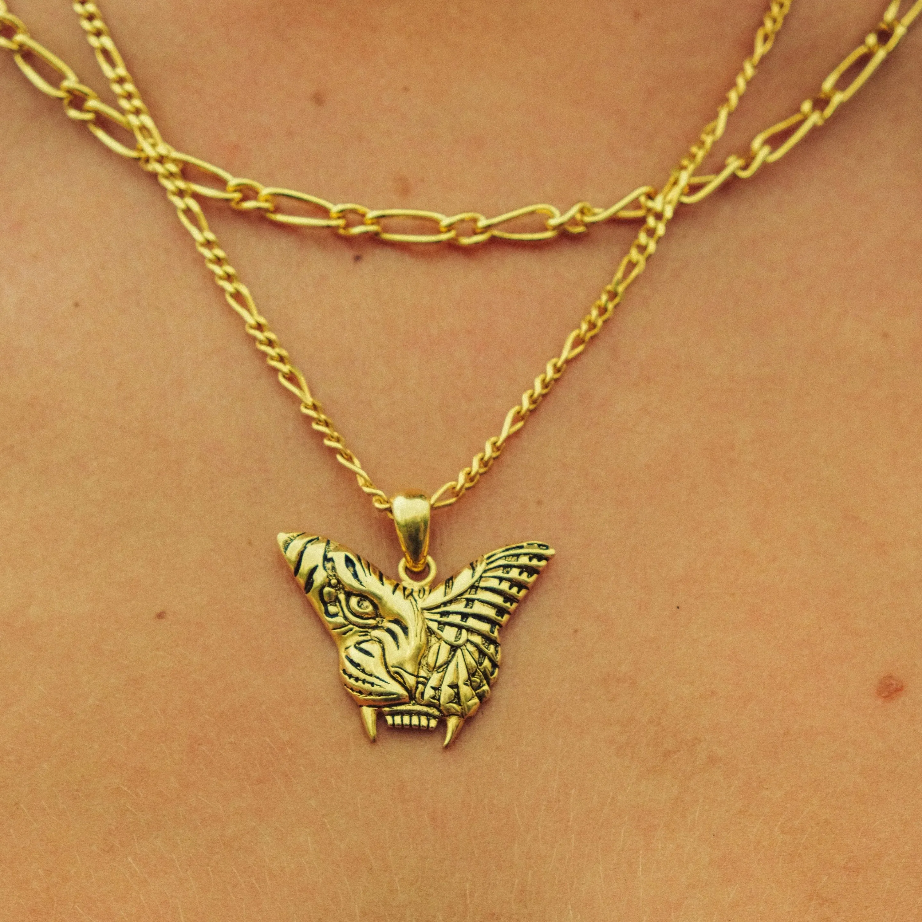 Tiger butterfly pendant in gold